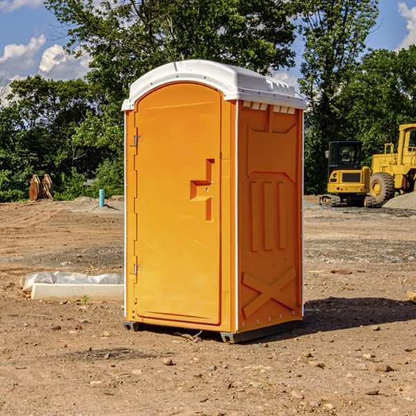 what is the cost difference between standard and deluxe portable restroom rentals in Brown County